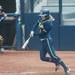 Michigan senior Amy Knapp hits the ball during the first inning for their game against Iowa at Alumni field Saturday, April 20.
Courtney Sacco I AnnArbor.com